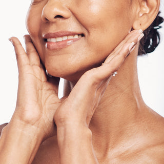 Woman touching her face